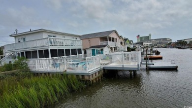 This Charming Multi Family 5 Bedroom,5 bath home nestled on the on Tidewater Golf Club and Plantation in South Carolina - for sale on GolfHomes.com, golf home, golf lot