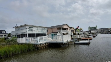 This Charming Multi Family 5 Bedroom,5 bath home nestled on the on Tidewater Golf Club and Plantation in South Carolina - for sale on GolfHomes.com, golf home, golf lot