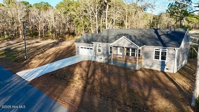 A stunning new construction ranch style home located right on on Minnesott Golf and Country Club in North Carolina - for sale on GolfHomes.com, golf home, golf lot