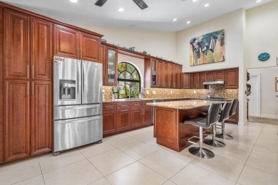 Nestled in the prestigious Boca Woods Country Club, meticulously on Boca Woods Country Club in Florida - for sale on GolfHomes.com, golf home, golf lot