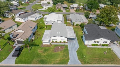 Welcome to this lovely two-bedroom, two-bath home located in the on Orange Blossom Hills Golf and Country Club in Florida - for sale on GolfHomes.com, golf home, golf lot