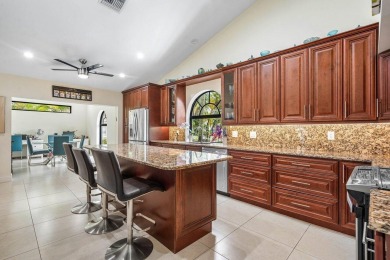 Nestled in the prestigious Boca Woods Country Club, meticulously on Boca Woods Country Club in Florida - for sale on GolfHomes.com, golf home, golf lot