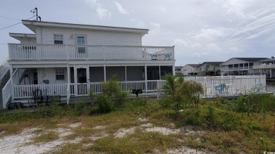 This Charming Multi Family 5 Bedroom,5 bath home nestled on the on Tidewater Golf Club and Plantation in South Carolina - for sale on GolfHomes.com, golf home, golf lot