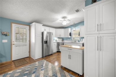 Welcome to this lovely two-bedroom, two-bath home located in the on Orange Blossom Hills Golf and Country Club in Florida - for sale on GolfHomes.com, golf home, golf lot