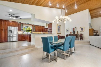 Nestled in the prestigious Boca Woods Country Club, meticulously on Boca Woods Country Club in Florida - for sale on GolfHomes.com, golf home, golf lot
