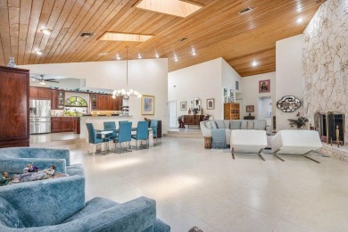 Nestled in the prestigious Boca Woods Country Club, meticulously on Boca Woods Country Club in Florida - for sale on GolfHomes.com, golf home, golf lot