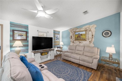 Welcome to this lovely two-bedroom, two-bath home located in the on Orange Blossom Hills Golf and Country Club in Florida - for sale on GolfHomes.com, golf home, golf lot