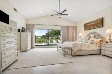 Nestled in the prestigious Boca Woods Country Club, meticulously on Boca Woods Country Club in Florida - for sale on GolfHomes.com, golf home, golf lot