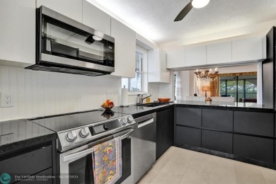Largest corner unit available in The Lakes of Environ, offering on Inverrary Country Club in Florida - for sale on GolfHomes.com, golf home, golf lot