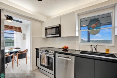 Largest corner unit available in The Lakes of Environ, offering on Inverrary Country Club in Florida - for sale on GolfHomes.com, golf home, golf lot