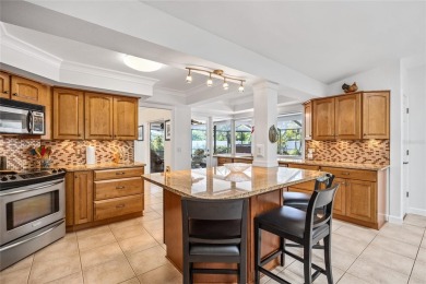 Welcome to this exceptional home in the highly sought-after on The Dunedin Country Club in Florida - for sale on GolfHomes.com, golf home, golf lot