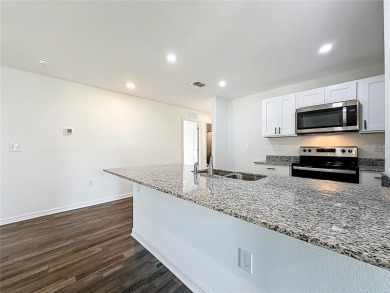 Why wait to build, when you can buy ready and new! Minutes away on The Oaks Golf Club in Florida - for sale on GolfHomes.com, golf home, golf lot