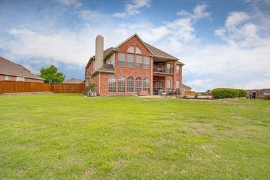 Located in a prestigious gated community, this exceptional home on Ridgeview Ranch Golf Club in Texas - for sale on GolfHomes.com, golf home, golf lot