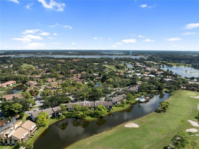 Beautiful Golf & Lake View Condo in The Meadows - Turnkey and on The Meadows Golf and Country Club in Florida - for sale on GolfHomes.com, golf home, golf lot