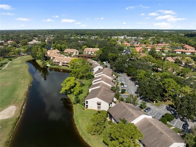 Beautiful Golf & Lake View Condo in The Meadows - Turnkey and on The Meadows Golf and Country Club in Florida - for sale on GolfHomes.com, golf home, golf lot