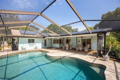 Welcome to this exceptional home in the highly sought-after on The Dunedin Country Club in Florida - for sale on GolfHomes.com, golf home, golf lot