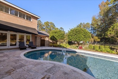 Architect's personal home with one-of-a-kind details that on Golden Eagle Country Club in Florida - for sale on GolfHomes.com, golf home, golf lot