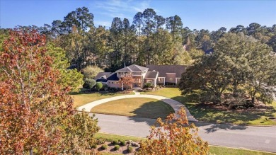 Architect's personal home with one-of-a-kind details that on Golden Eagle Country Club in Florida - for sale on GolfHomes.com, golf home, golf lot