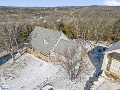 Nestled on a private lot in a gated community, this hidden gem on Ledgestone Country Club and Golf Course in Missouri - for sale on GolfHomes.com, golf home, golf lot