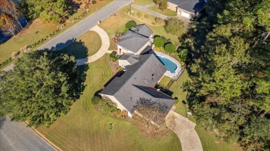 Architect's personal home with one-of-a-kind details that on Golden Eagle Country Club in Florida - for sale on GolfHomes.com, golf home, golf lot