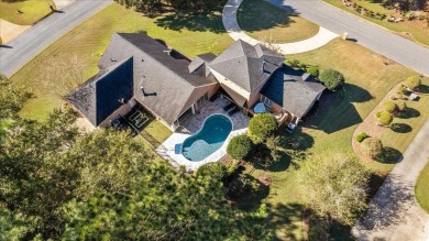 Architect's personal home with one-of-a-kind details that on Golden Eagle Country Club in Florida - for sale on GolfHomes.com, golf home, golf lot