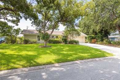 Welcome to this exceptional home in the highly sought-after on The Dunedin Country Club in Florida - for sale on GolfHomes.com, golf home, golf lot