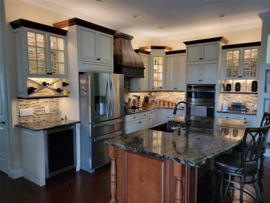 Tropical Cabana-Style Retreat in Sought-After Golf Course on Silverthorn Country Club in Florida - for sale on GolfHomes.com, golf home, golf lot