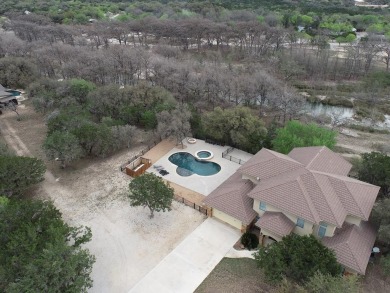 RIVERFRONT With Pool! Mediterranean estate sprawls across 2.01 on The Club At ConCan in Texas - for sale on GolfHomes.com, golf home, golf lot