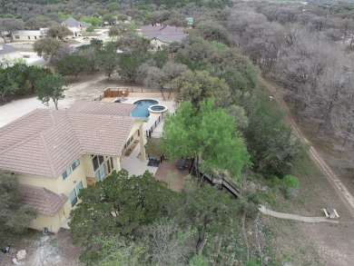 RIVERFRONT With Pool! Mediterranean estate sprawls across 2.01 on The Club At ConCan in Texas - for sale on GolfHomes.com, golf home, golf lot