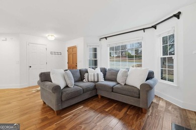 Welcome to 618 Wedgewood Drive, a refined golf-course residence on Canongate At Eagle Watch Golf Club in Georgia - for sale on GolfHomes.com, golf home, golf lot