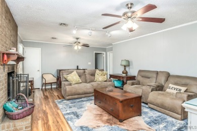 Move in ready home with updated flooring, spacious floor plan & on Arrowhead Country Club in Alabama - for sale on GolfHomes.com, golf home, golf lot