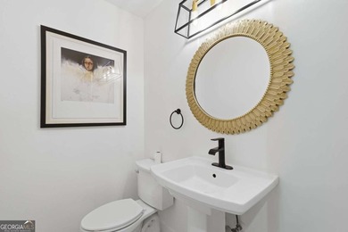 Welcome to 618 Wedgewood Drive, a refined golf-course residence on Canongate At Eagle Watch Golf Club in Georgia - for sale on GolfHomes.com, golf home, golf lot