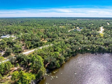 LAKE VIEW LOT! Electric is running on this road. Easy access to on Seminole Lakes Country Club in Florida - for sale on GolfHomes.com, golf home, golf lot
