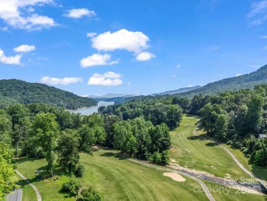 Enjoy stunning views of both Lake Lure and Rumbling Bald on Rumbling Bald Resort on Lake Lure in North Carolina - for sale on GolfHomes.com, golf home, golf lot