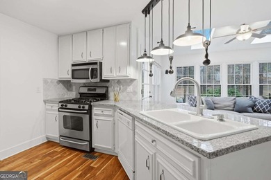 Welcome to 618 Wedgewood Drive, a refined golf-course residence on Canongate At Eagle Watch Golf Club in Georgia - for sale on GolfHomes.com, golf home, golf lot