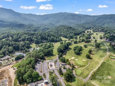Enjoy stunning views of both Lake Lure and Rumbling Bald on Rumbling Bald Resort on Lake Lure in North Carolina - for sale on GolfHomes.com, golf home, golf lot