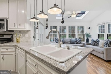 Welcome to 618 Wedgewood Drive, a refined golf-course residence on Canongate At Eagle Watch Golf Club in Georgia - for sale on GolfHomes.com, golf home, golf lot