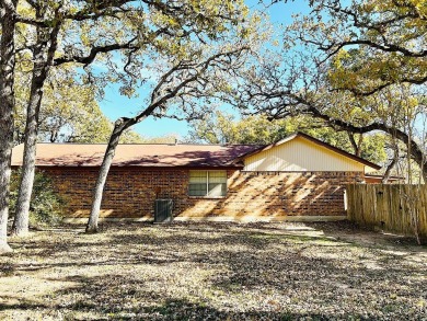 Charming brick home in Bluff Haven, ready for you to make it on Frisch Auf Valley Country Club in Texas - for sale on GolfHomes.com, golf home, golf lot