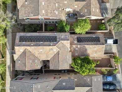 Located in Verrado's Main Street District with OWNED SOLAR & A on Verrado Golf Club  in Arizona - for sale on GolfHomes.com, golf home, golf lot