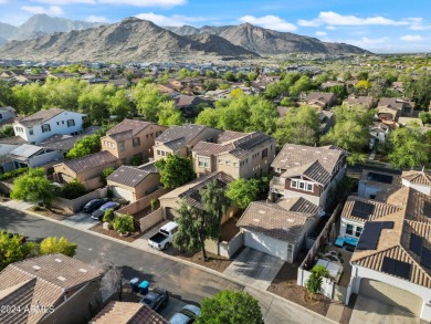 Located in Verrado's Main Street District with OWNED SOLAR & A on Verrado Golf Club  in Arizona - for sale on GolfHomes.com, golf home, golf lot