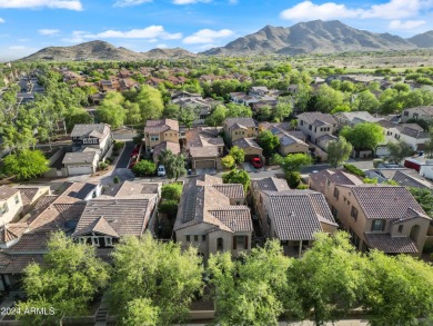 Located in Verrado's Main Street District with OWNED SOLAR & A on Verrado Golf Club  in Arizona - for sale on GolfHomes.com, golf home, golf lot