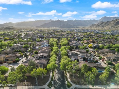 Located in Verrado's Main Street District with OWNED SOLAR & A on Verrado Golf Club  in Arizona - for sale on GolfHomes.com, golf home, golf lot