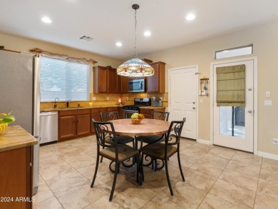 Located in Verrado's Main Street District with OWNED SOLAR & A on Verrado Golf Club  in Arizona - for sale on GolfHomes.com, golf home, golf lot