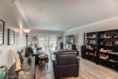 AN ABSOLUTE MUST SEE!! TOTALLY REMODELED PENTHOUSE UNIT. NEW CGI on Wynmoor Golf Course in Florida - for sale on GolfHomes.com, golf home, golf lot