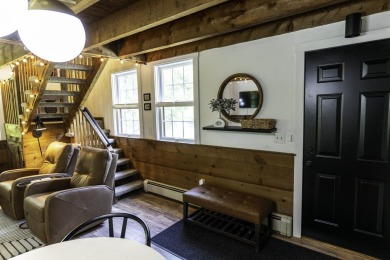 This beautifully reimagined Quechee Hollow end unit is turnkey! on Quechee Club in Vermont - for sale on GolfHomes.com, golf home, golf lot