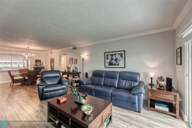 AN ABSOLUTE MUST SEE!! TOTALLY REMODELED PENTHOUSE UNIT. NEW CGI on Wynmoor Golf Course in Florida - for sale on GolfHomes.com, golf home, golf lot