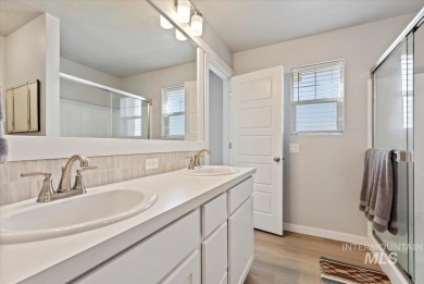 Experience effortless luxury in this move-in-ready townhome on Eagle Legacy Golf Course in Idaho - for sale on GolfHomes.com, golf home, golf lot