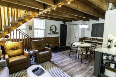 This beautifully reimagined Quechee Hollow end unit is turnkey! on Quechee Club in Vermont - for sale on GolfHomes.com, golf home, golf lot