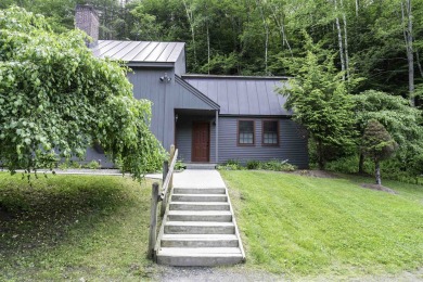 This beautifully reimagined Quechee Hollow end unit is turnkey! on Quechee Club in Vermont - for sale on GolfHomes.com, golf home, golf lot