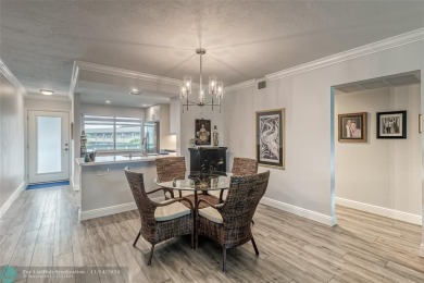 AN ABSOLUTE MUST SEE!! TOTALLY REMODELED PENTHOUSE UNIT. NEW CGI on Wynmoor Golf Course in Florida - for sale on GolfHomes.com, golf home, golf lot